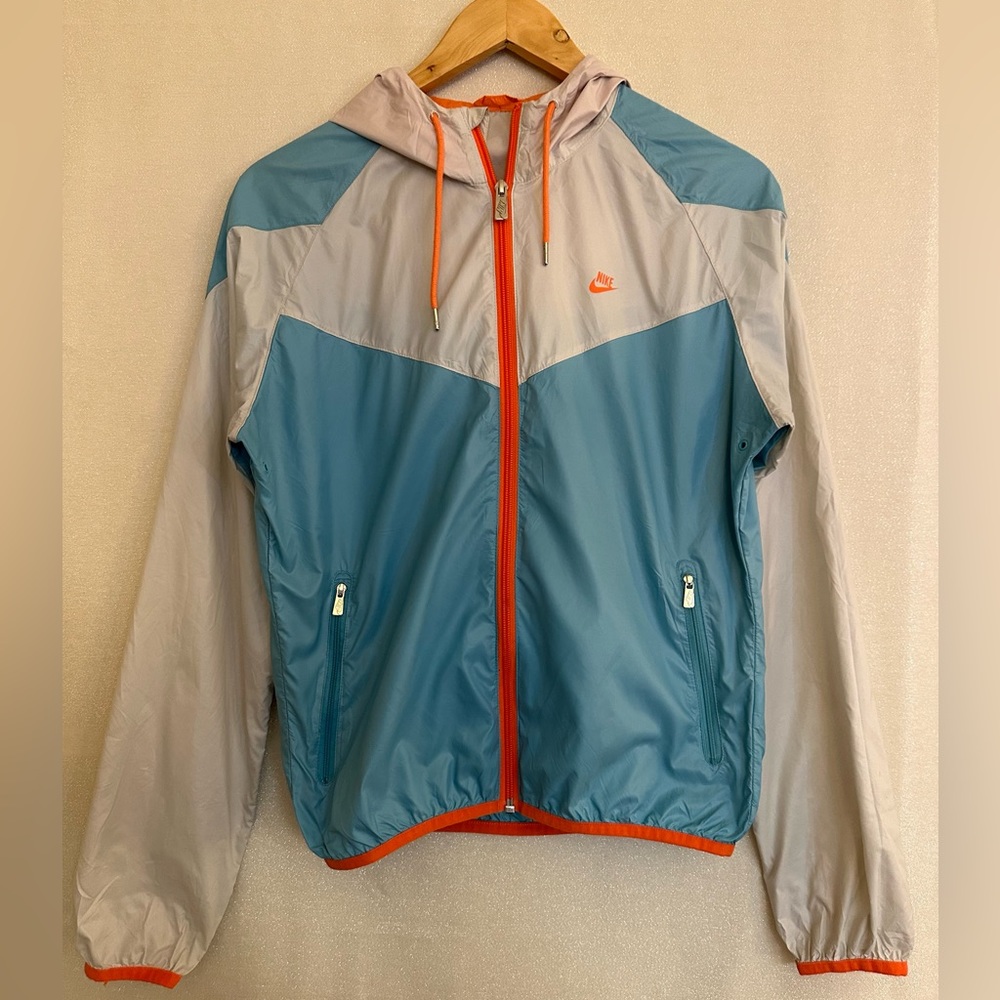 Nike Nylon light breathable rain Jacket in grey, light blue & high light orange.